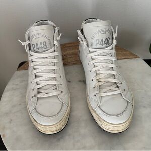 P448 Skate High Top white Leather Shoes
Women’s size 39 fits 8.5-9US